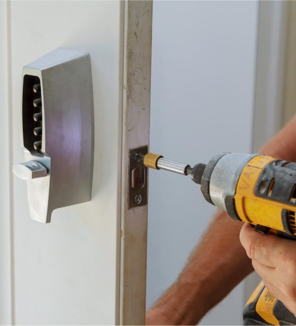 man-installing-of-the-door-with-lock-key-security-2021-08-30-22-58-04-utc.jpg